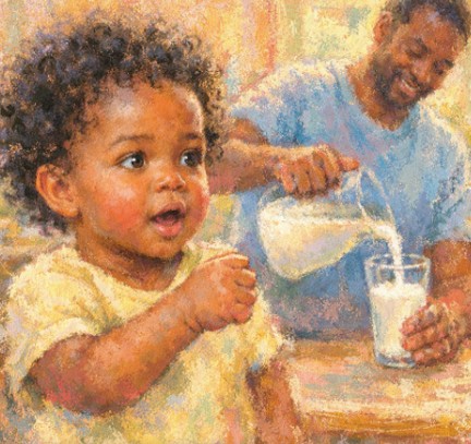 Baby making the sign for milk — repeatedly opening and closing a fist