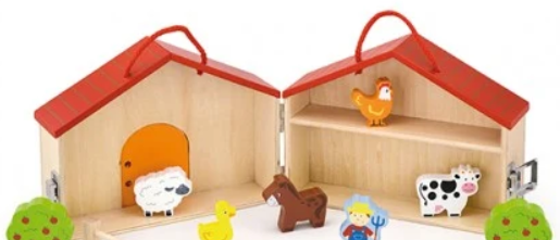 A toy barn and house with small figures, a storytelling language toy for 18 months and up